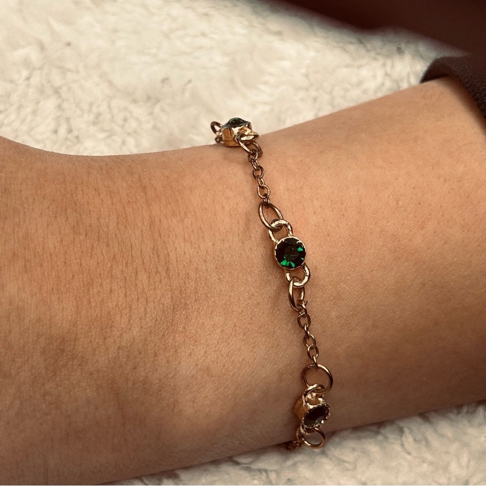 Elegant Gold Bracelet with Green Accents